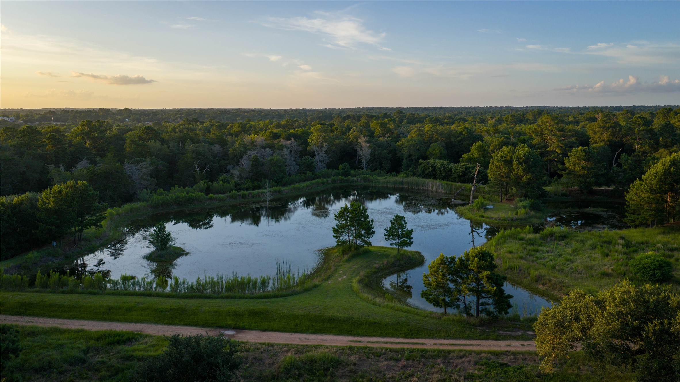 2080 Zimmerscheidt Road Columbus, TX 78934 - Photo 10 of 15 an aerial view of a house with garden space and lake view