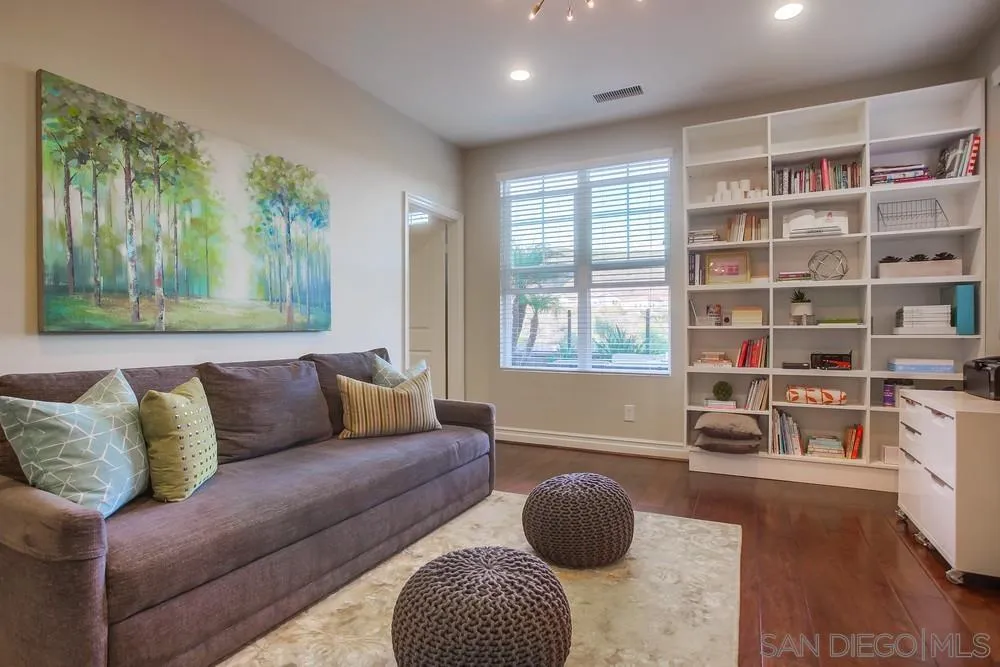 7535 Circulo Sequoia Carlsbad, CA 92009 - Photo 16 of 57 a living room with furniture and a large window