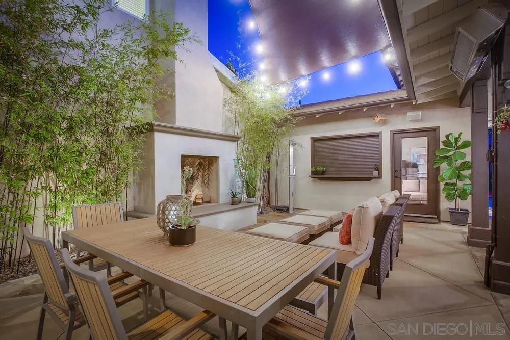 7535 Circulo Sequoia Carlsbad, CA 92009 - Photo 23 of 57 a view of a dining room with furniture window and wooden floor