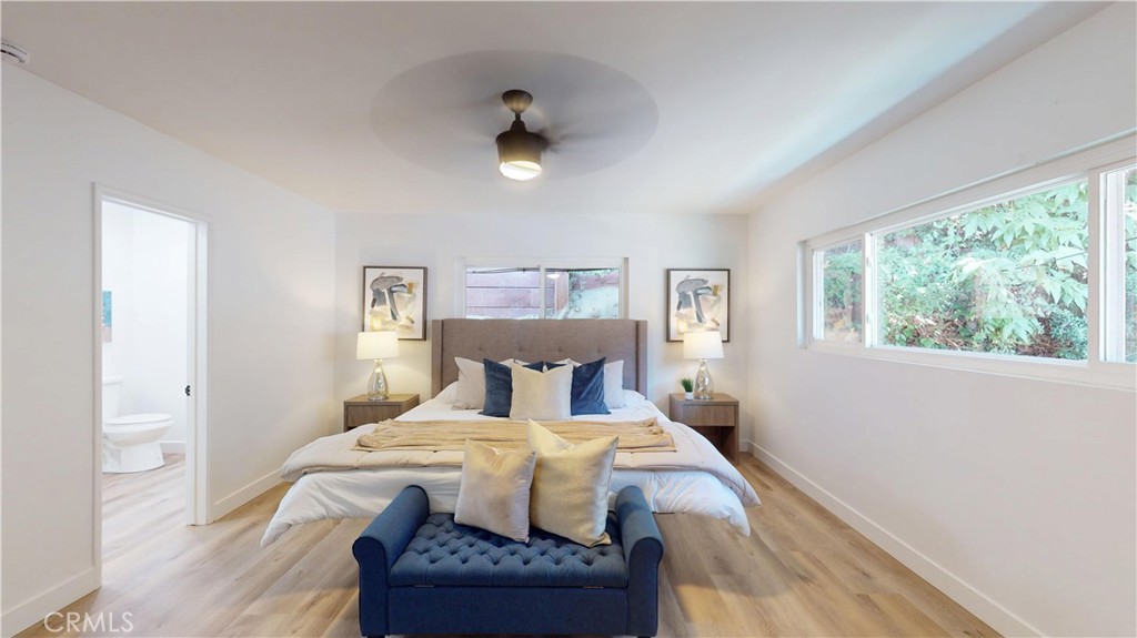 1354 Shadow Fullerton, CA 92831 - Photo 21 of 30 a bedroom with a bed and a large window