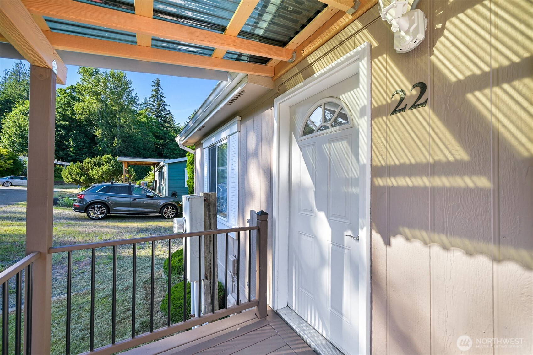 2174 Yew Street Road, Unit 22 Bellingham, WA 98229 - Photo 5 of 36 a view of a porch with wooden floor