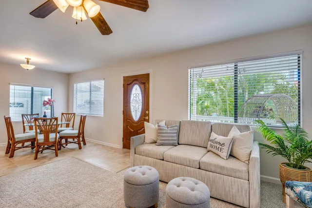 a view of a workspace with furniture