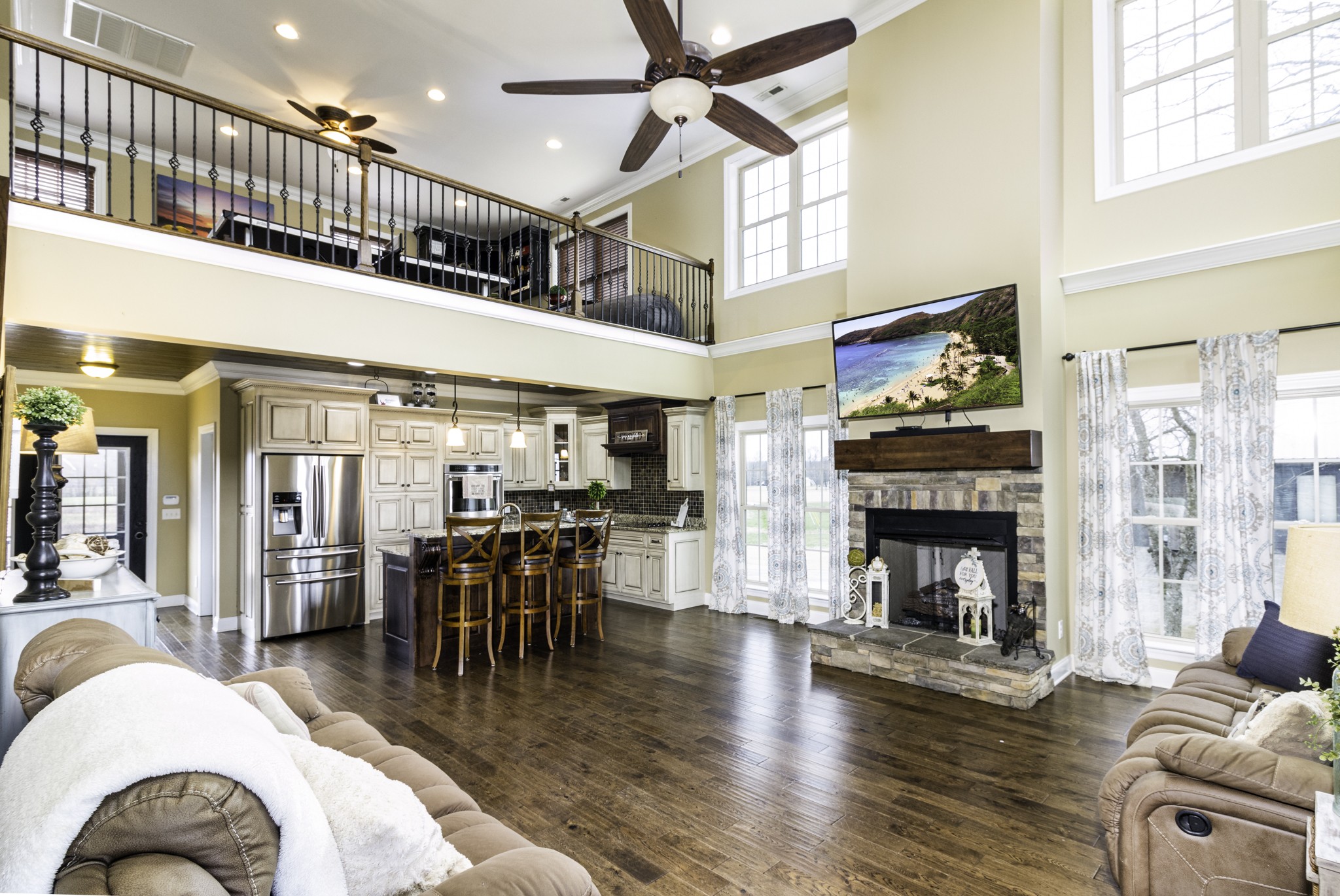 1705 Col James Hardin Road Clifton, TN 38425 - Photo 13 of 53 a living room with furniture a fireplace and wooden floor