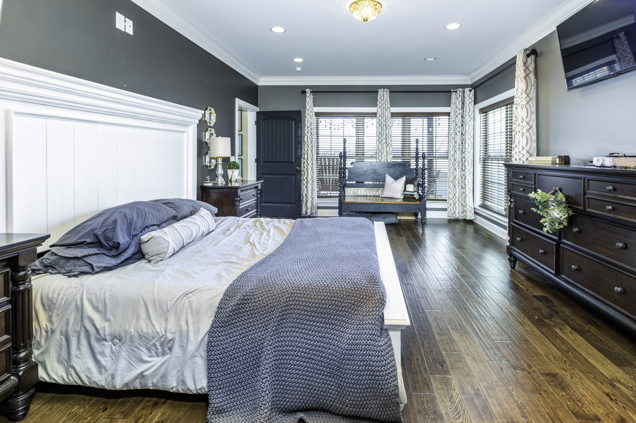 1705 Col James Hardin Road Clifton, TN 38425 - Photo 20 of 53 a bedroom with a bed and large windows