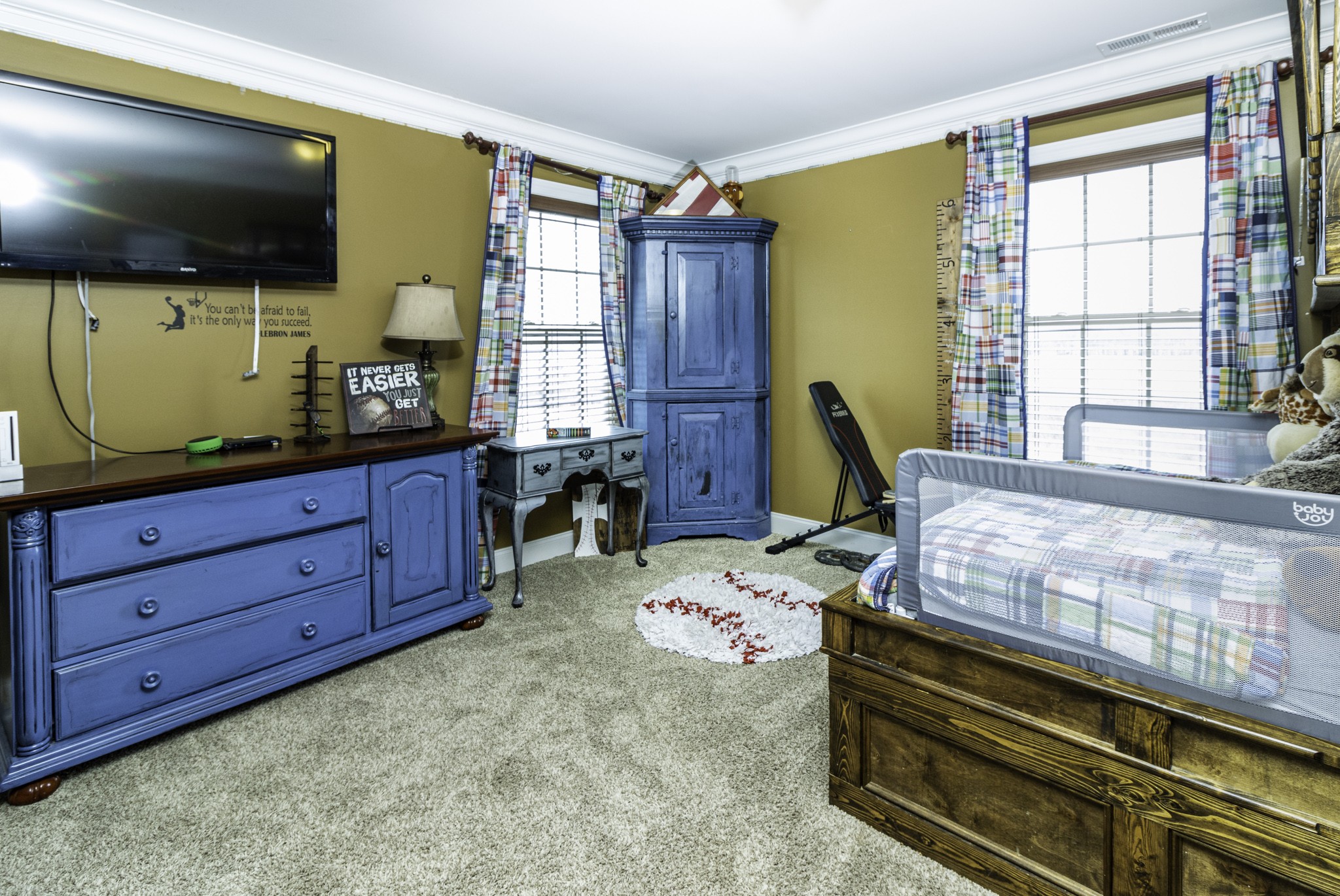 1705 Col James Hardin Road Clifton, TN 38425 - Photo 27 of 53 a bedroom with a bed tv and a window