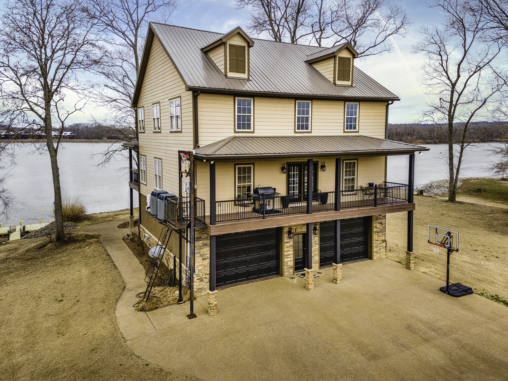 1705 Col James Hardin Road Clifton, TN 38425 - Photo 3 of 53 a front view of a house with a yard