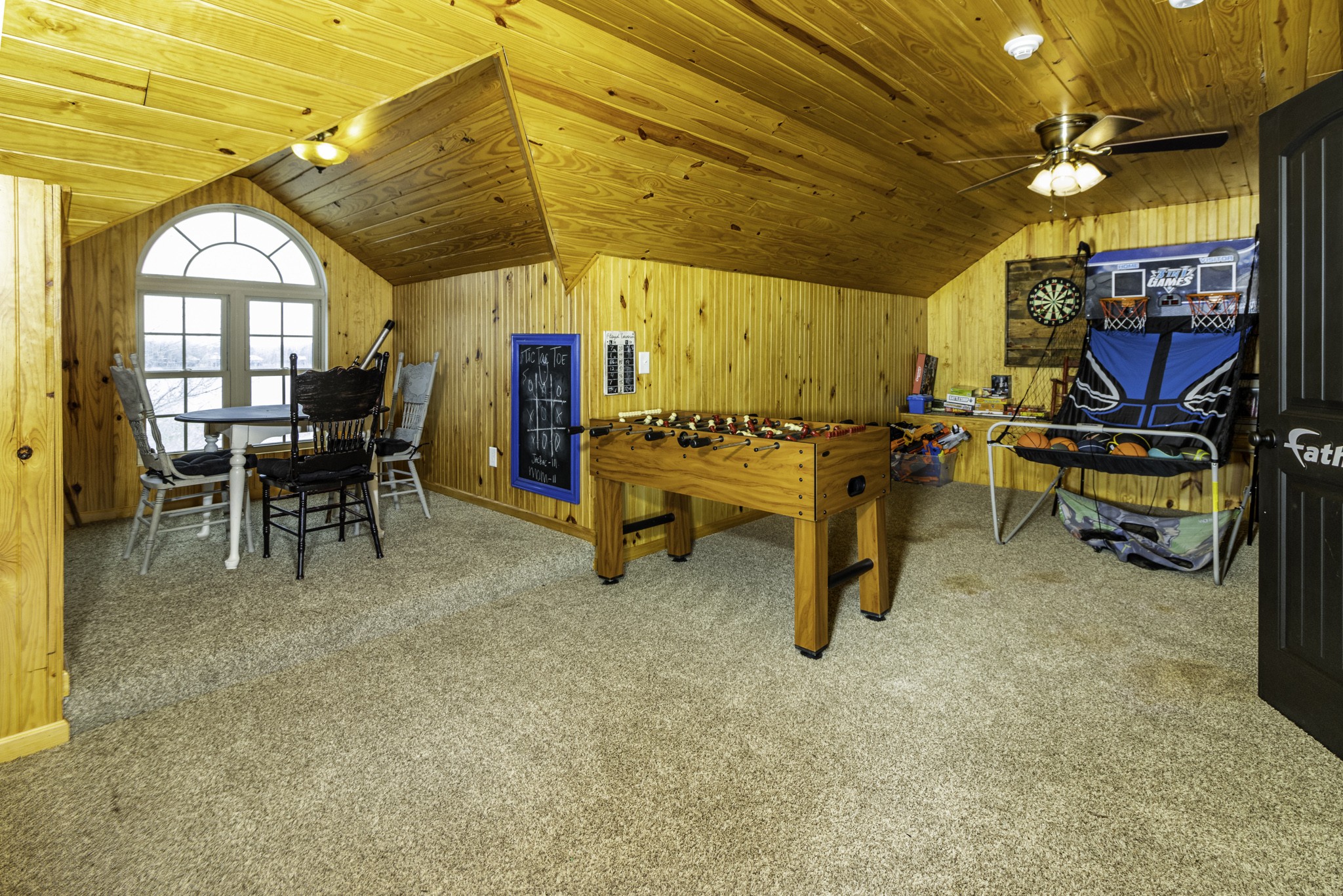 1705 Col James Hardin Road Clifton, TN 38425 - Photo 32 of 53 a view of a big room with dining area a chandelier and pool table