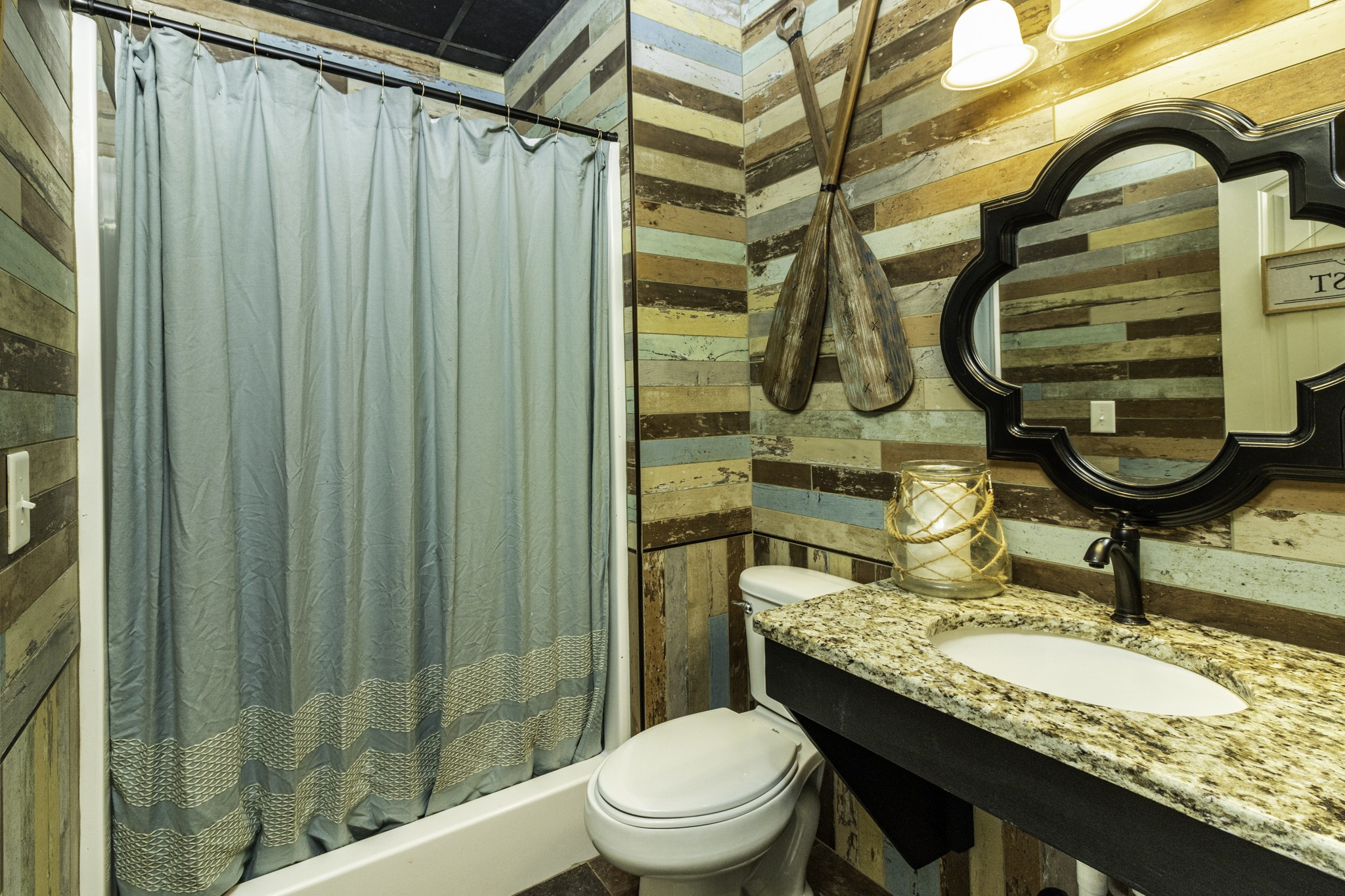 1705 Col James Hardin Road Clifton, TN 38425 - Photo 34 of 53 a bathroom with a granite countertop sink toilet and shower