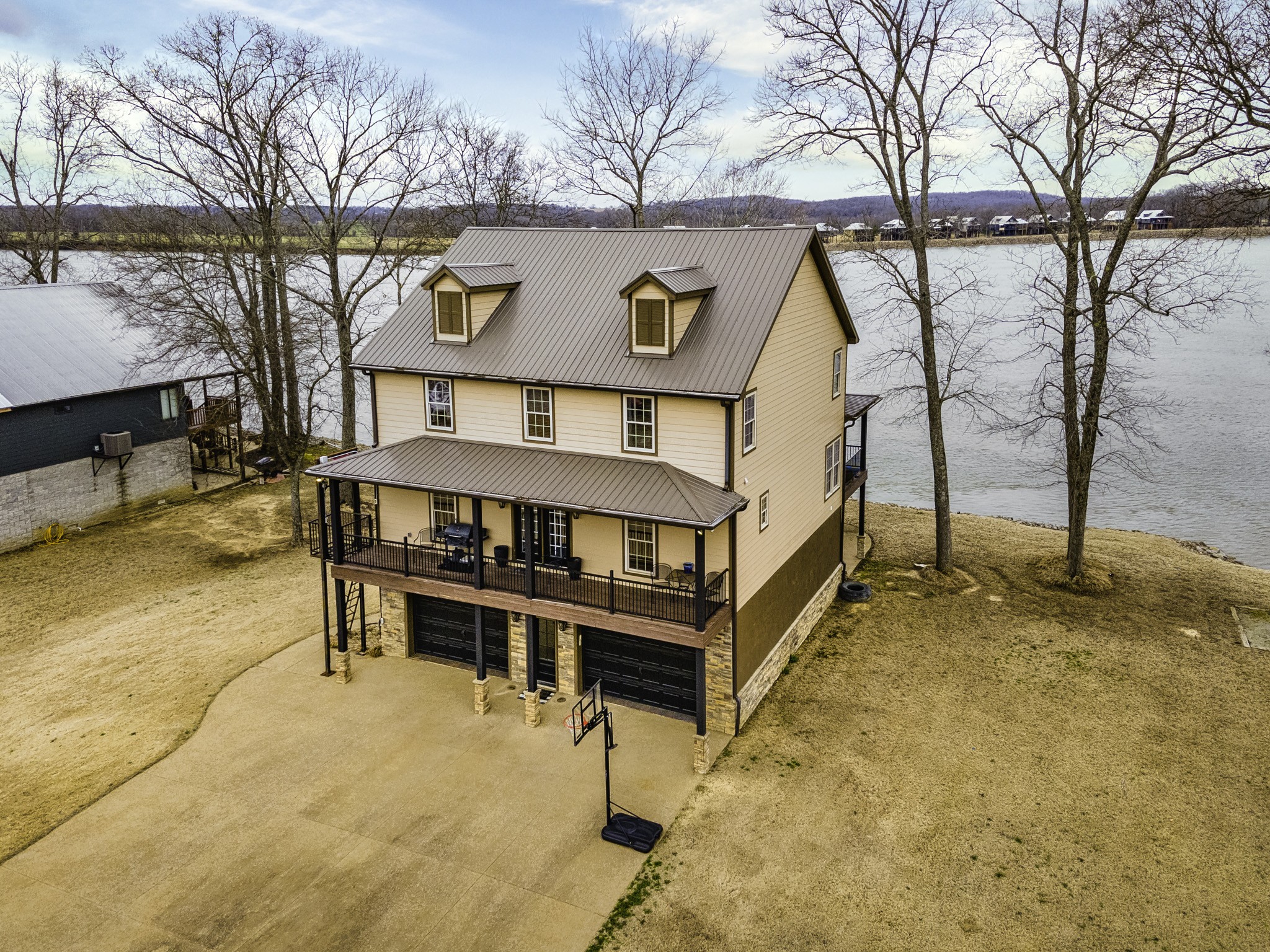 1705 Col James Hardin Road Clifton, TN 38425 - Photo 49 of 53 a view of a house with a wooden fence