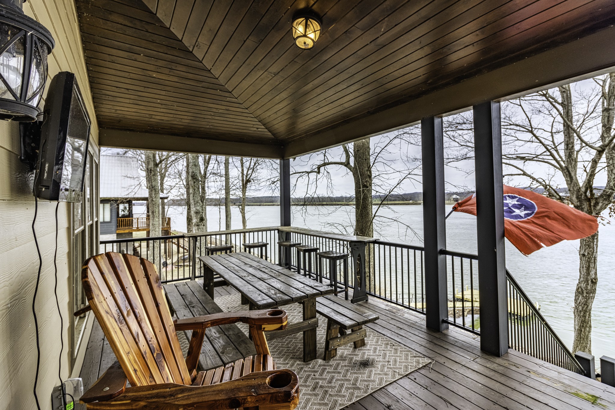 1705 Col James Hardin Road Clifton, TN 38425 - Photo 10 of 53 a view of balcony with wooden floor and outdoor seating