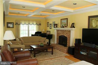 1914 Green Spring Road Winchester, VA 22603 - Photo 5 of 30 Coffered ceilings & wood-burning FP in Family Rm