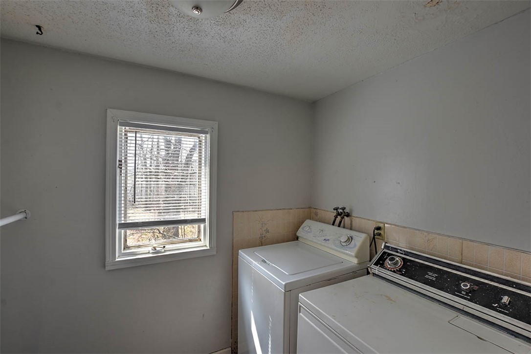 3315 Mount Zion Road Decatur, IL 62521 - Photo 19 of 28 a utility room with dryer and washer