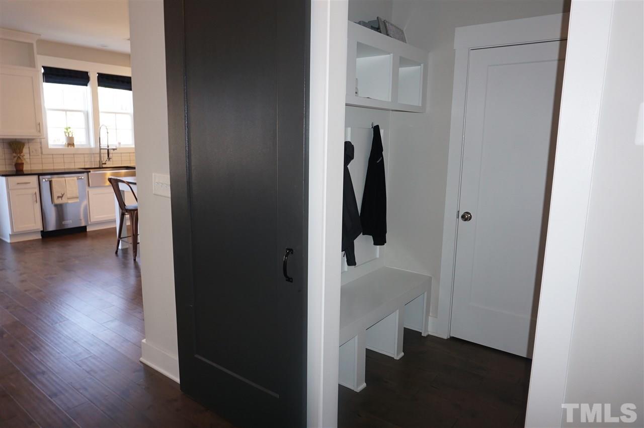 1720 Chestnut Falls Road Wendell, NC 27591 - Photo 12 of 30 Mud room with sliding barn door and coat closet.