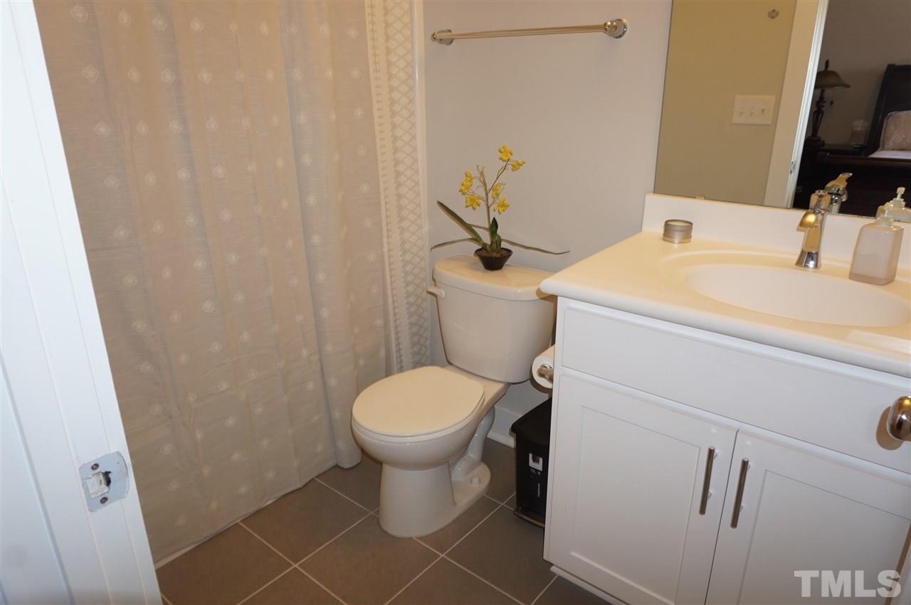 1720 Chestnut Falls Road Wendell, NC 27591 - Photo 21 of 30 All baths have tile floors.