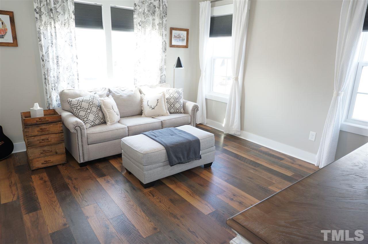 1720 Chestnut Falls Road Wendell, NC 27591 - Photo 24 of 30 Could be used as a bonus room. Beautiful custom laminate flooring upstairs.