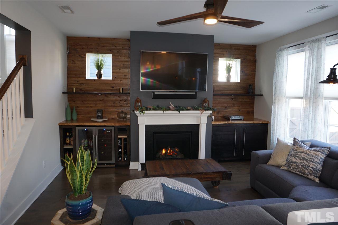 1720 Chestnut Falls Road Wendell, NC 27591 - Photo 9 of 30 New built-ins with wine chiller (nego). Gas logs.