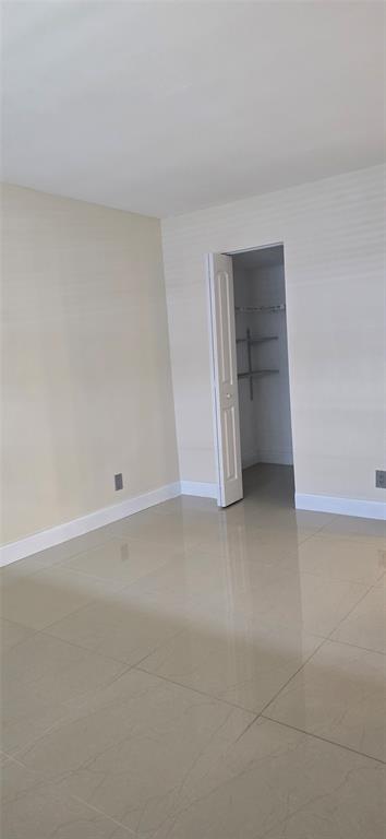 8000 South Colony Circle, Unit 309 Tamarac, FL 33321 - Photo 14 of 19 a view of an empty room