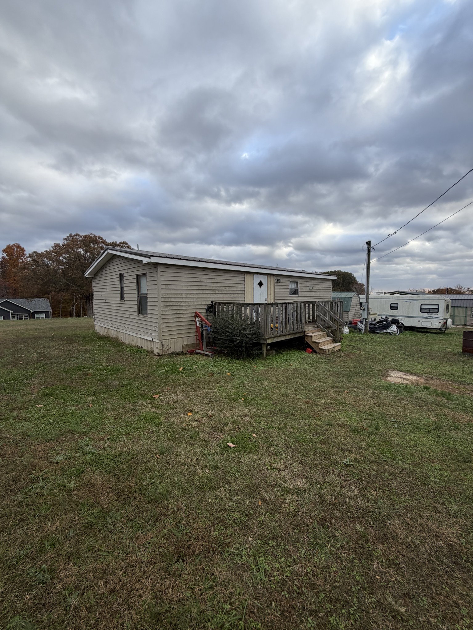 106 Mutt Road White Bluff, TN 37187 - Photo 2 of 4 a view of a house with a yard