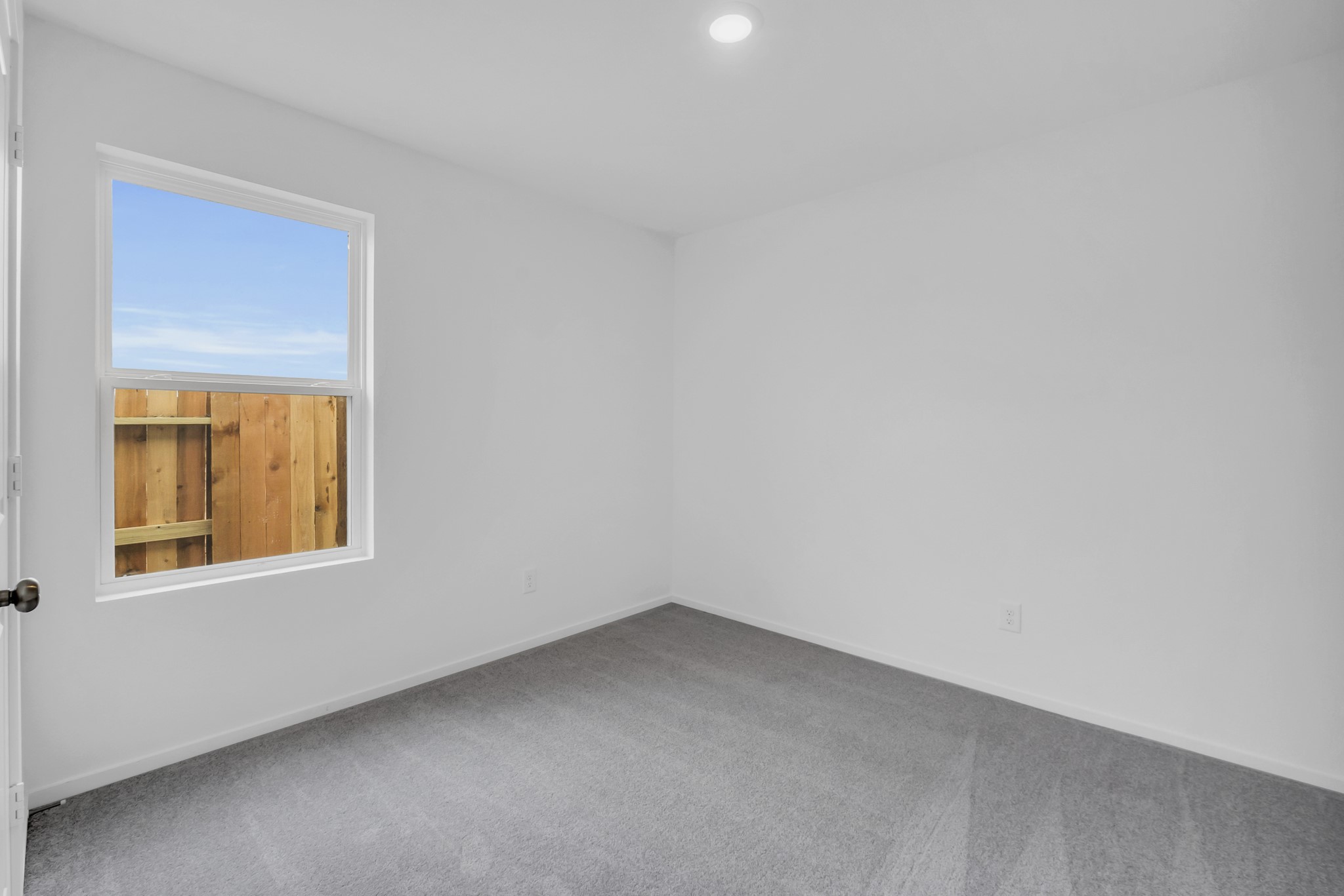 3622 Atlas Pt Lane Angleton, TX 77515 - Photo 14 of 16 a view of an empty room with a window