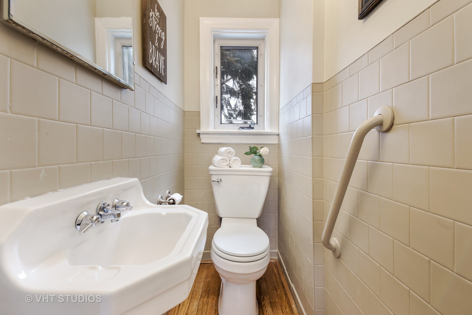 429 Shenstone Road Riverside, IL 60546 - Photo 14 of 16 a bathroom with a sink and mirror with toilet