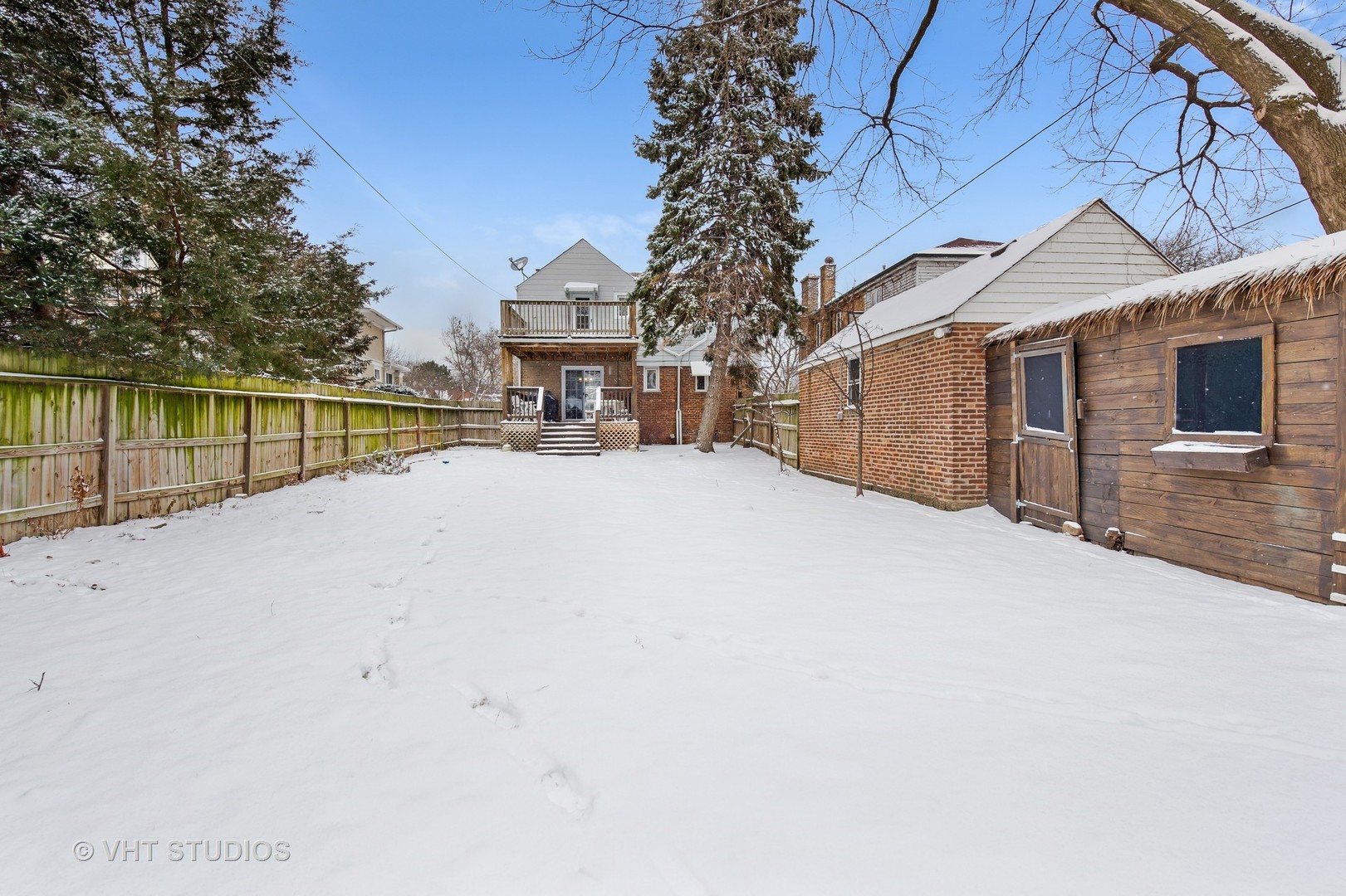 429 Shenstone Road Riverside, IL 60546 - Photo 15 of 16 a view of a house with a snow in the yard