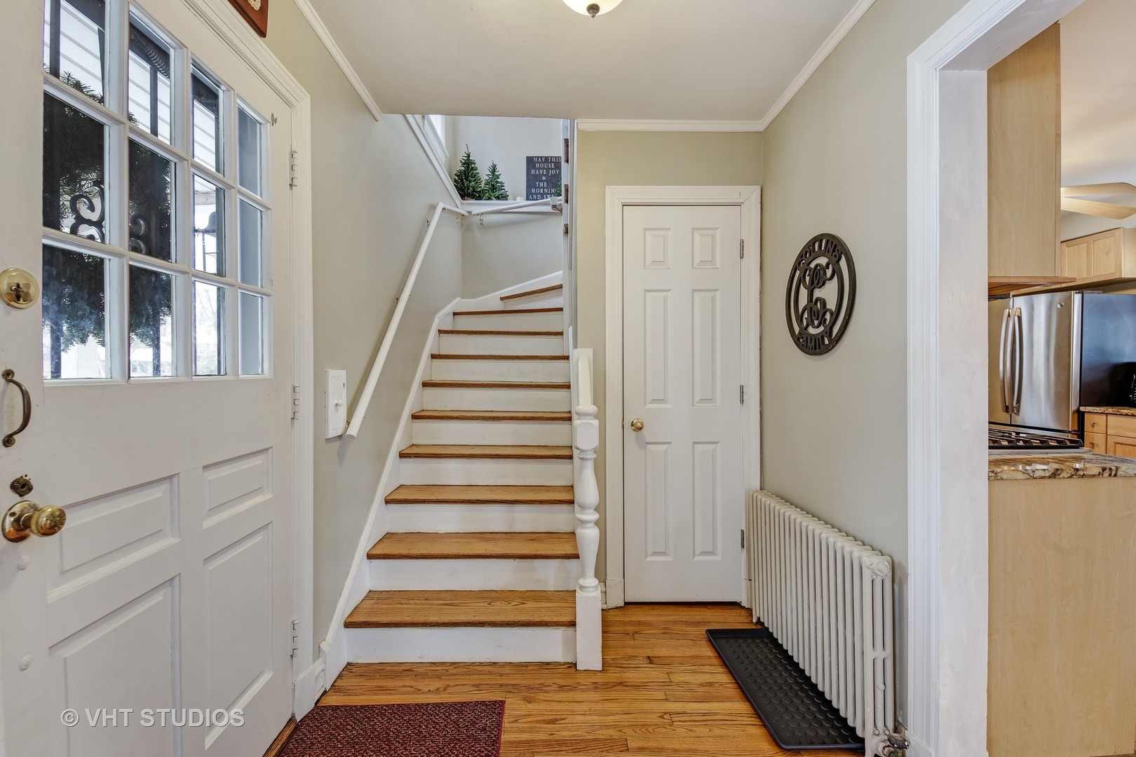 429 Shenstone Road Riverside, IL 60546 - Photo 5 of 16 a view of a hallway with wooden floor and windows