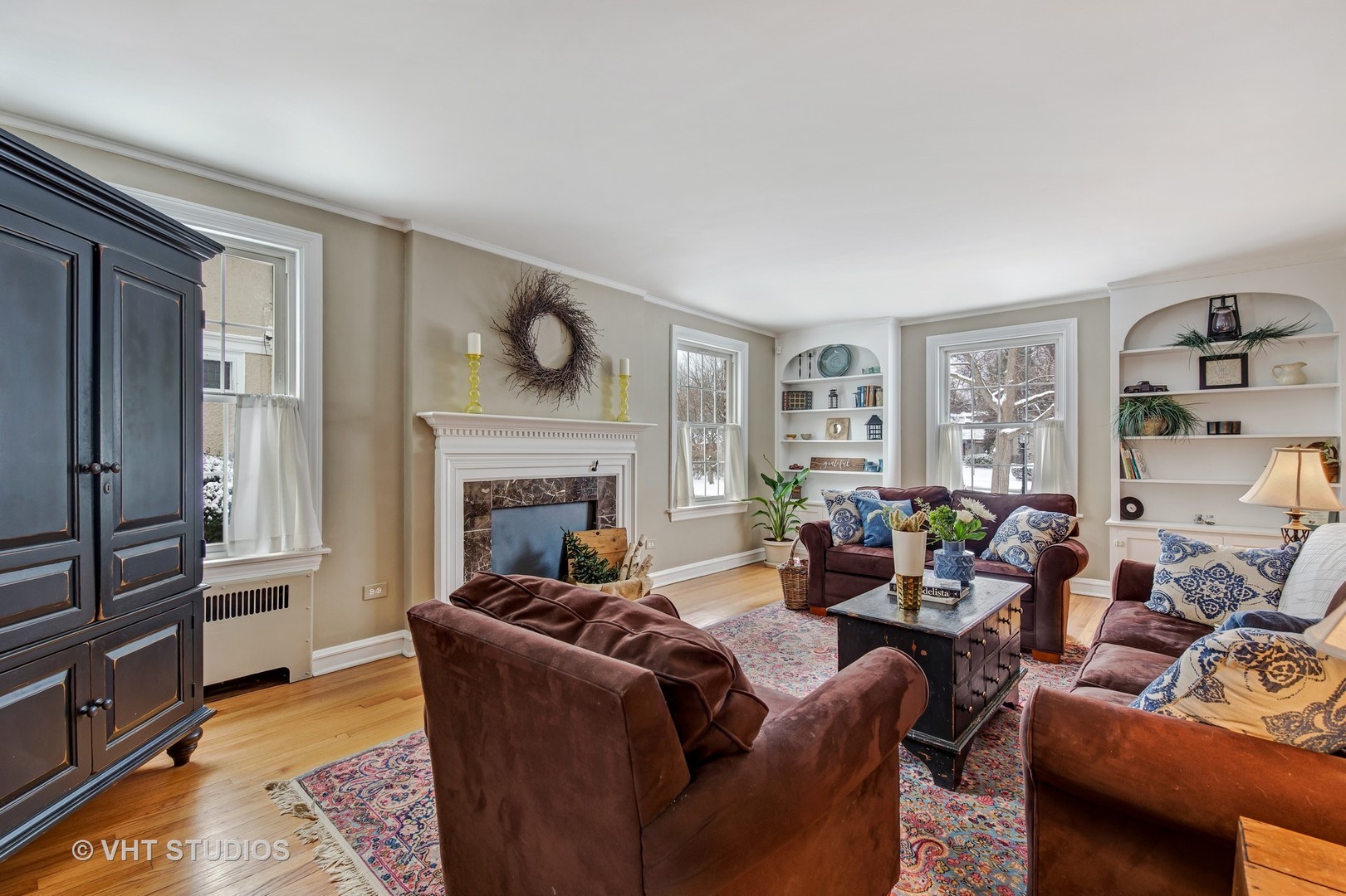 429 Shenstone Road Riverside, IL 60546 - Photo 6 of 16 a living room with furniture and a fireplace