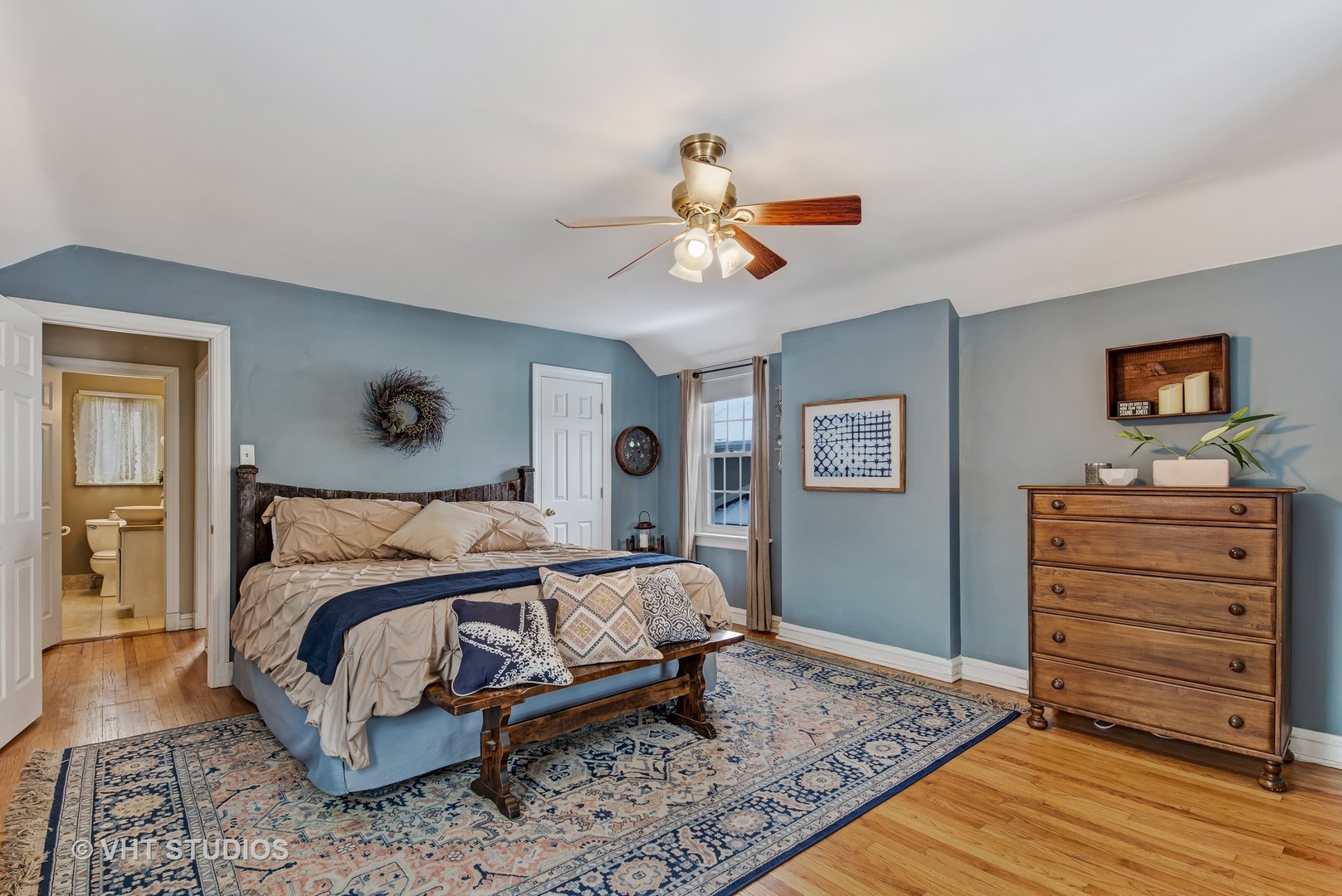 429 Shenstone Road Riverside, IL 60546 - Photo 8 of 16 a bedroom with a bed and a chandelier