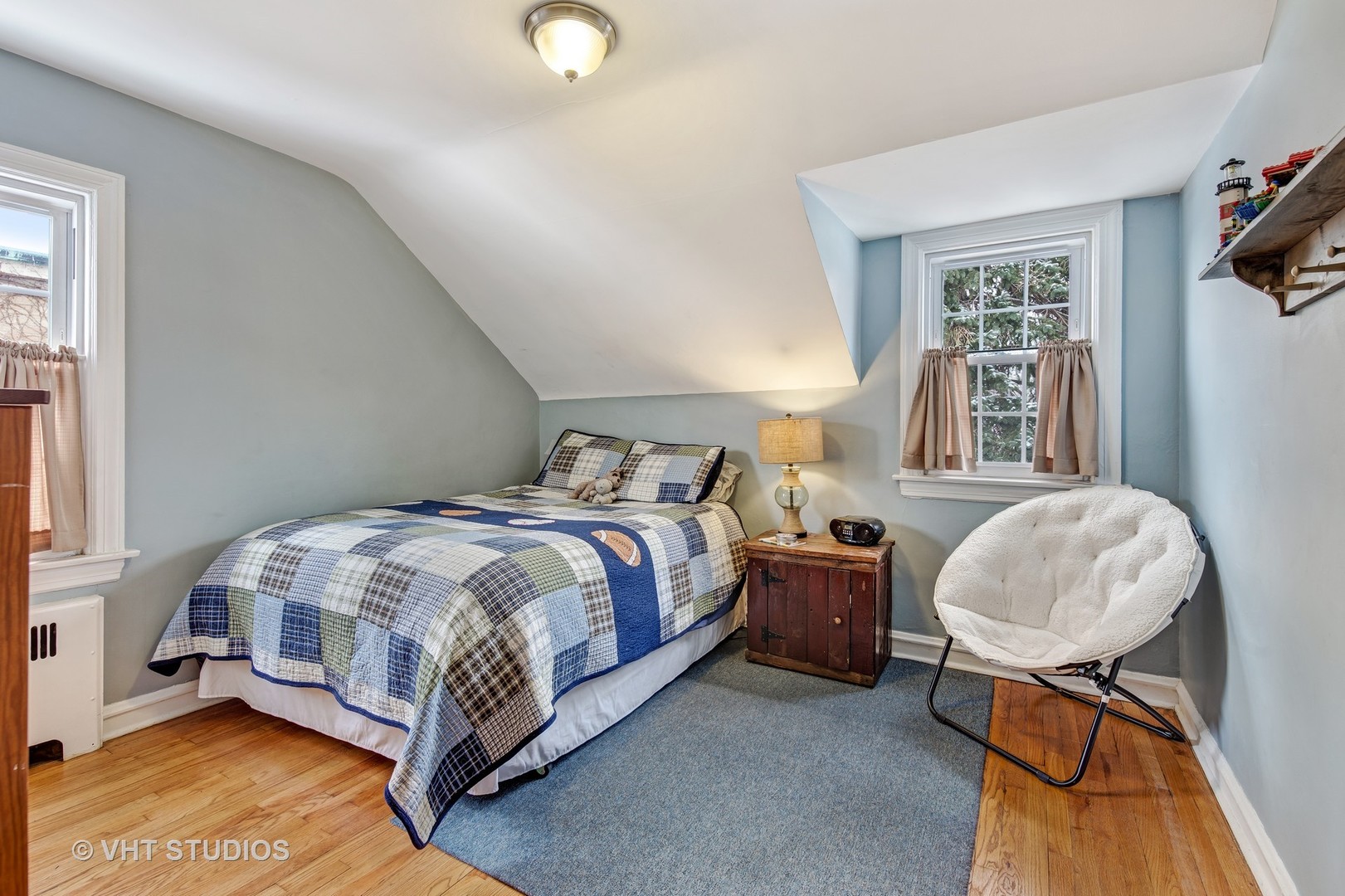 429 Shenstone Road Riverside, IL 60546 - Photo 9 of 16 a bedroom with a bed and a window