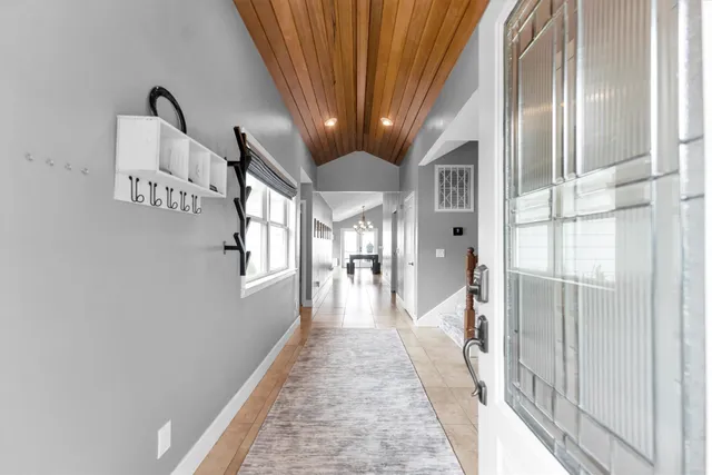 a kitchen with a stove and a fireplace