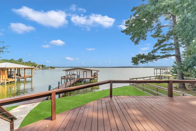an aerial view of a house with outdoor space
