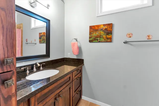 a bathroom with a sink and a toilet