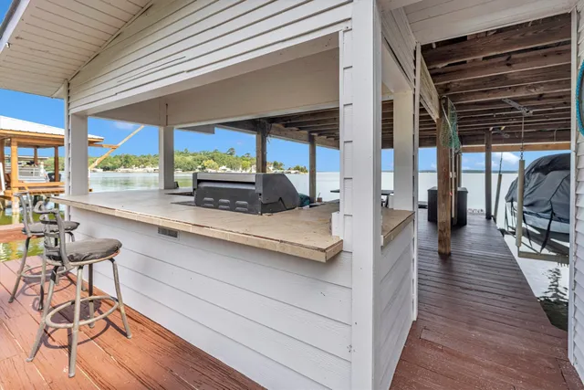 a view of a hall with wooden floor