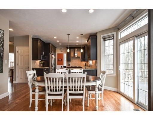 7 Willow Road Ashland, MA 01721 - Photo 6 of 32 a view of a dining room with furniture and wooden floor