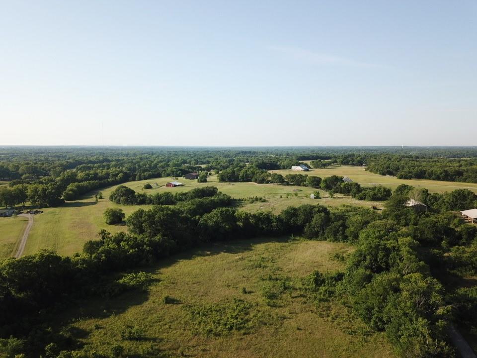 Tbd Ball Road Whitewright, TX 75491 - Photo 7 of 18 Expansive acreage featuring mature trees and open fields