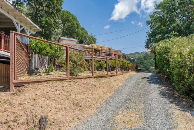 a view of a patio with swimming pool