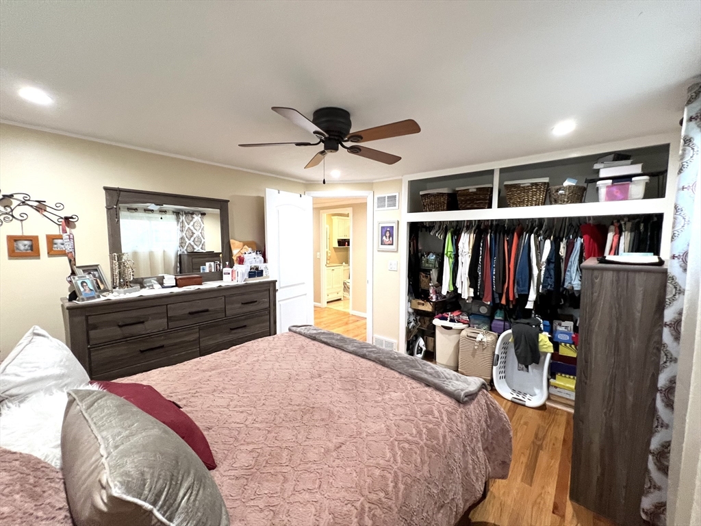 18 Shirley Road Springfield, MA 01109 - Photo 11 of 39 a bed room with a bed and a large mirror