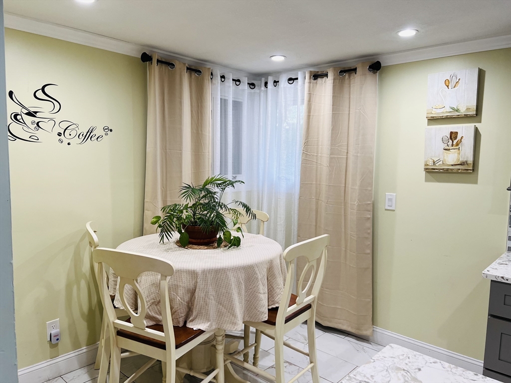 18 Shirley Road Springfield, MA 01109 - Photo 24 of 39 a dining room with furniture and window