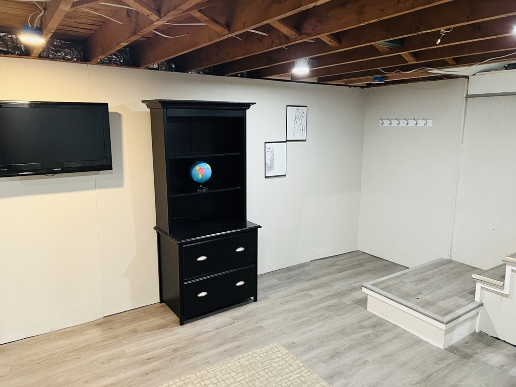 18 Shirley Road Springfield, MA 01109 - Photo 29 of 39 a room with a flat screen tv