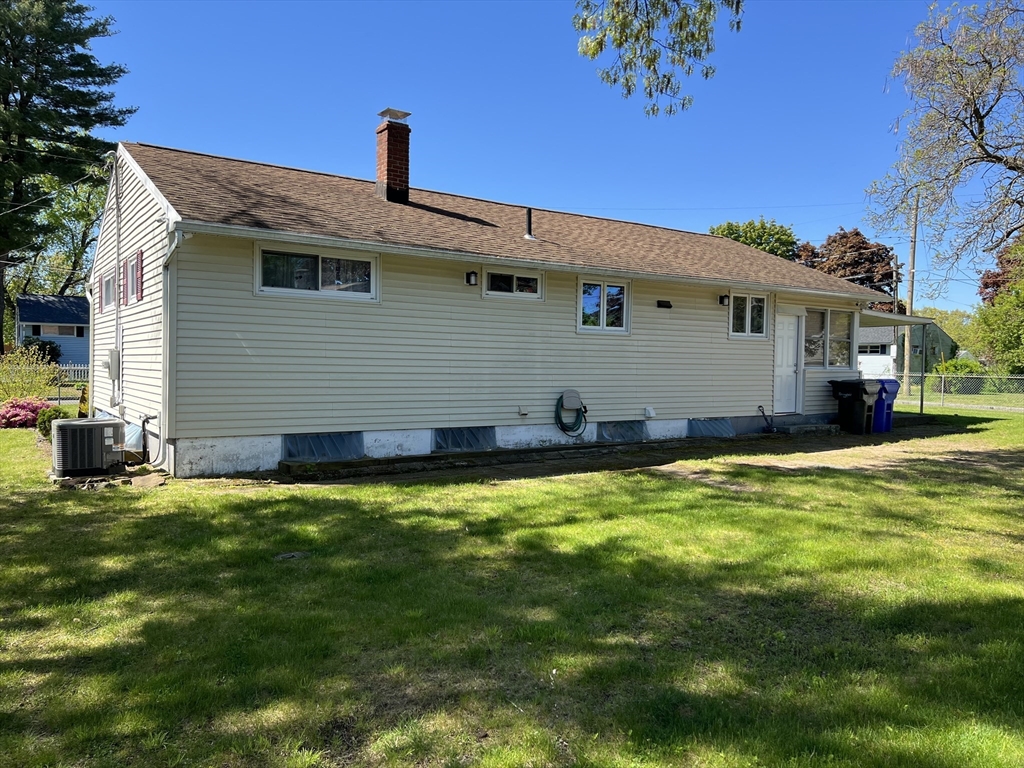 18 Shirley Road Springfield, MA 01109 - Photo 37 of 39 a front view of a house with a yard