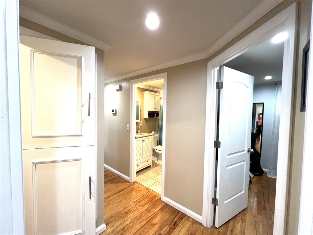 18 Shirley Road Springfield, MA 01109 - Photo 6 of 39 a view of hallway with walk in closet and living room