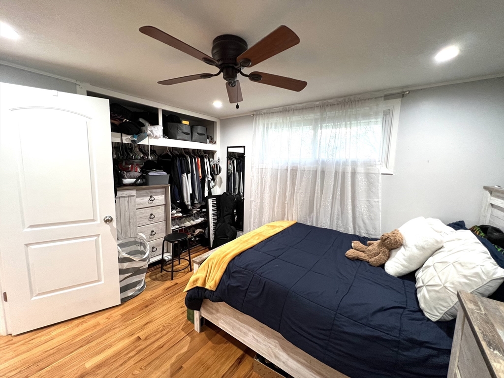 18 Shirley Road Springfield, MA 01109 - Photo 9 of 39 a bedroom with a bed and a ceiling fan
