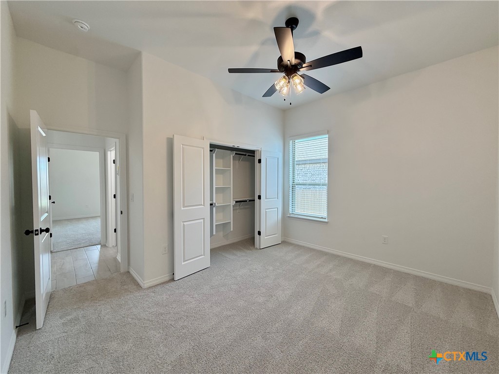 2016 Yarrow Road Temple, TX 76502 - Photo 16 of 30 wooden floor in an empty room and a ceiling fan