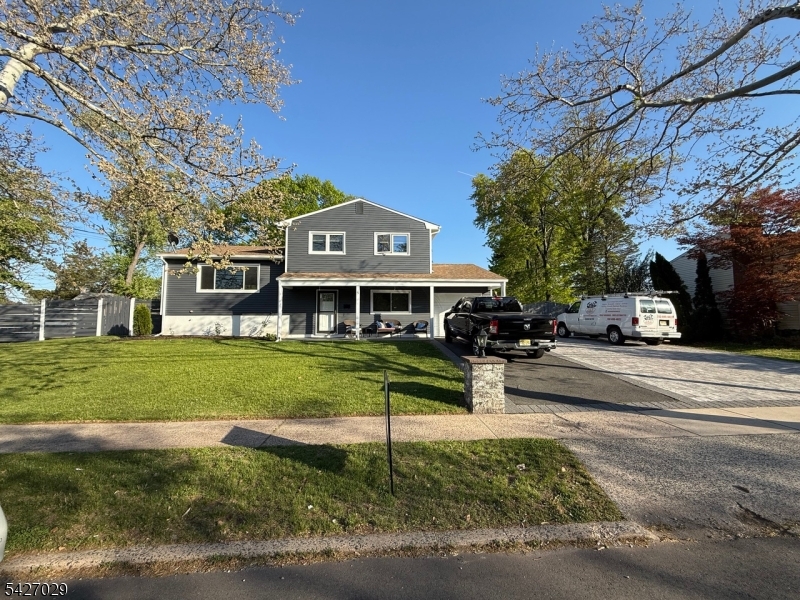 5 Appleman Road Somerset, NJ 08873 - Photo 12 of 12 a front view of a house with a yard
