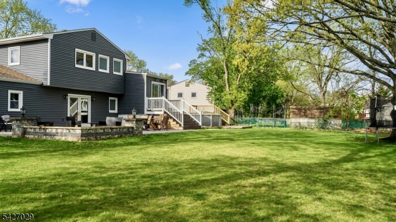 5 Appleman Road Somerset, NJ 08873 - Photo 4 of 12 a view of a house with a yard porch and sitting area