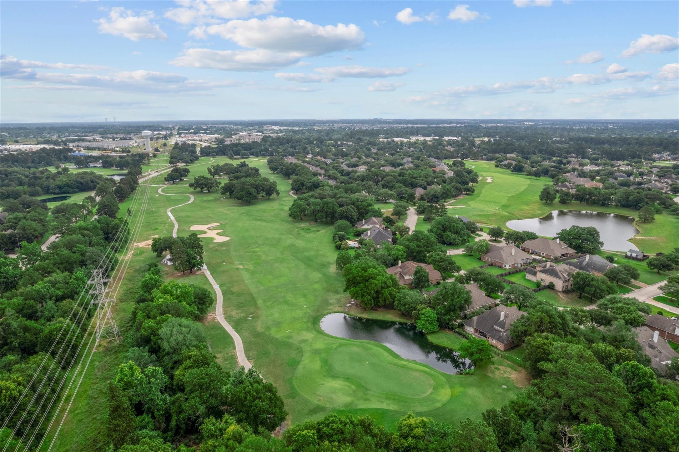 6323 Stone Trail Lane Spring, TX 77379 - Photo 34 of 43 an aerial view of green landscape with trees all around