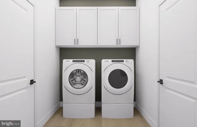 a utility room with dryer and washer