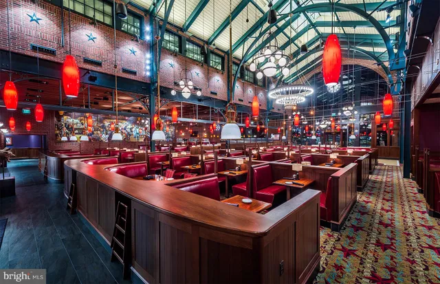 a city street filled with lots of traffic and tall building