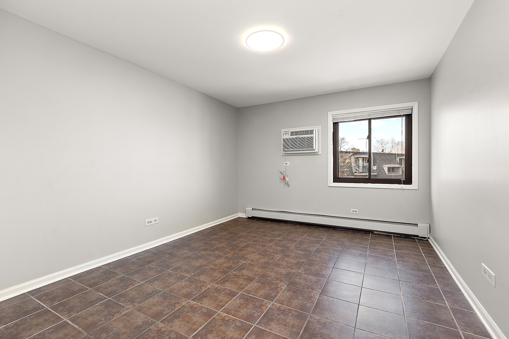 254 East Bailey Road, Unit M Naperville, IL 60565 - Photo 13 of 27 an empty room with windows