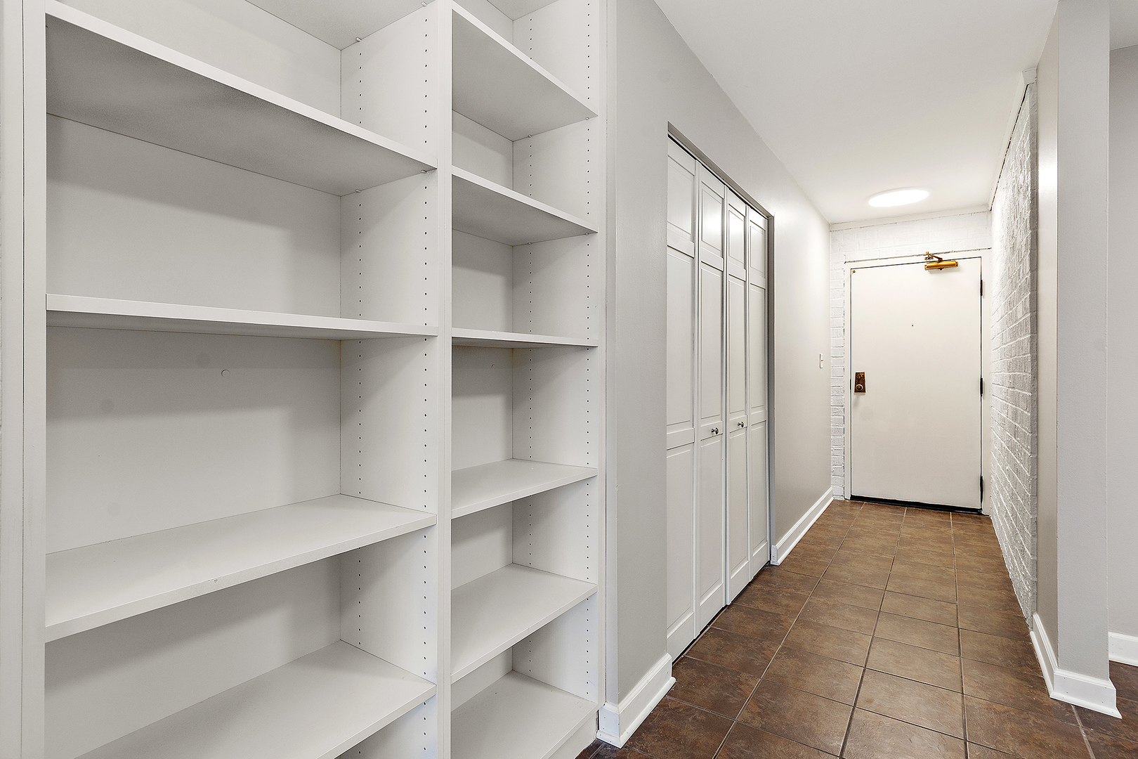 254 East Bailey Road, Unit M Naperville, IL 60565 - Photo 2 of 27 a view of an empty walk in closet